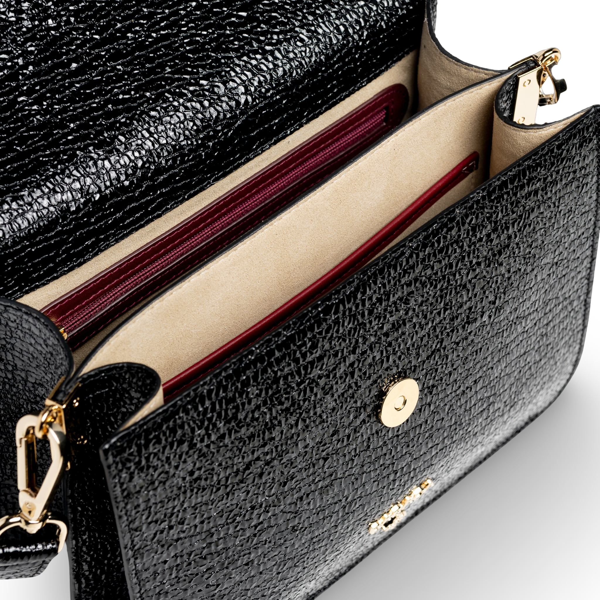 Goat skin crossbody bag with wrinkled patent leather finish