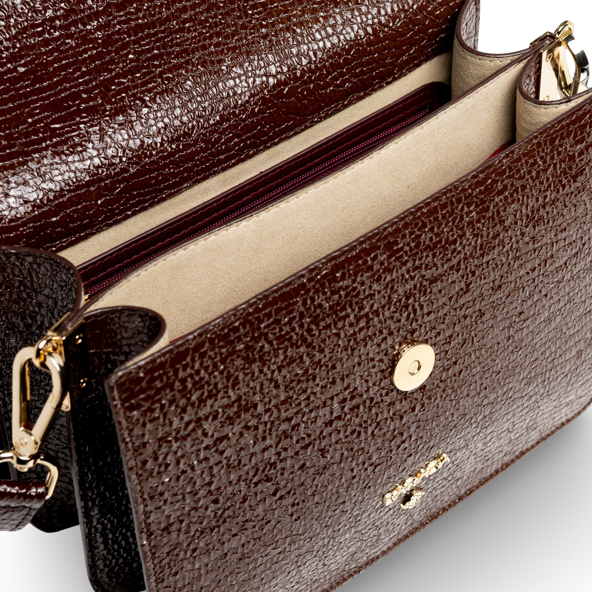 Goat skin crossbody bag with wrinkled patent leather finish