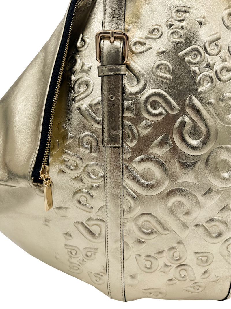 Detalles de grabado en Bolso grande de piel para mujer de alta calidad de color dorado